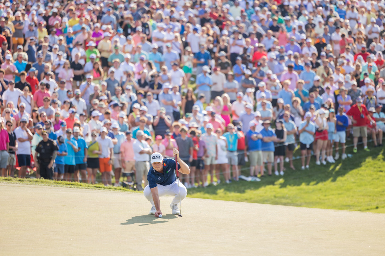Viktor Hovland on the 18th green after winning the 2023 Memorial Tournament